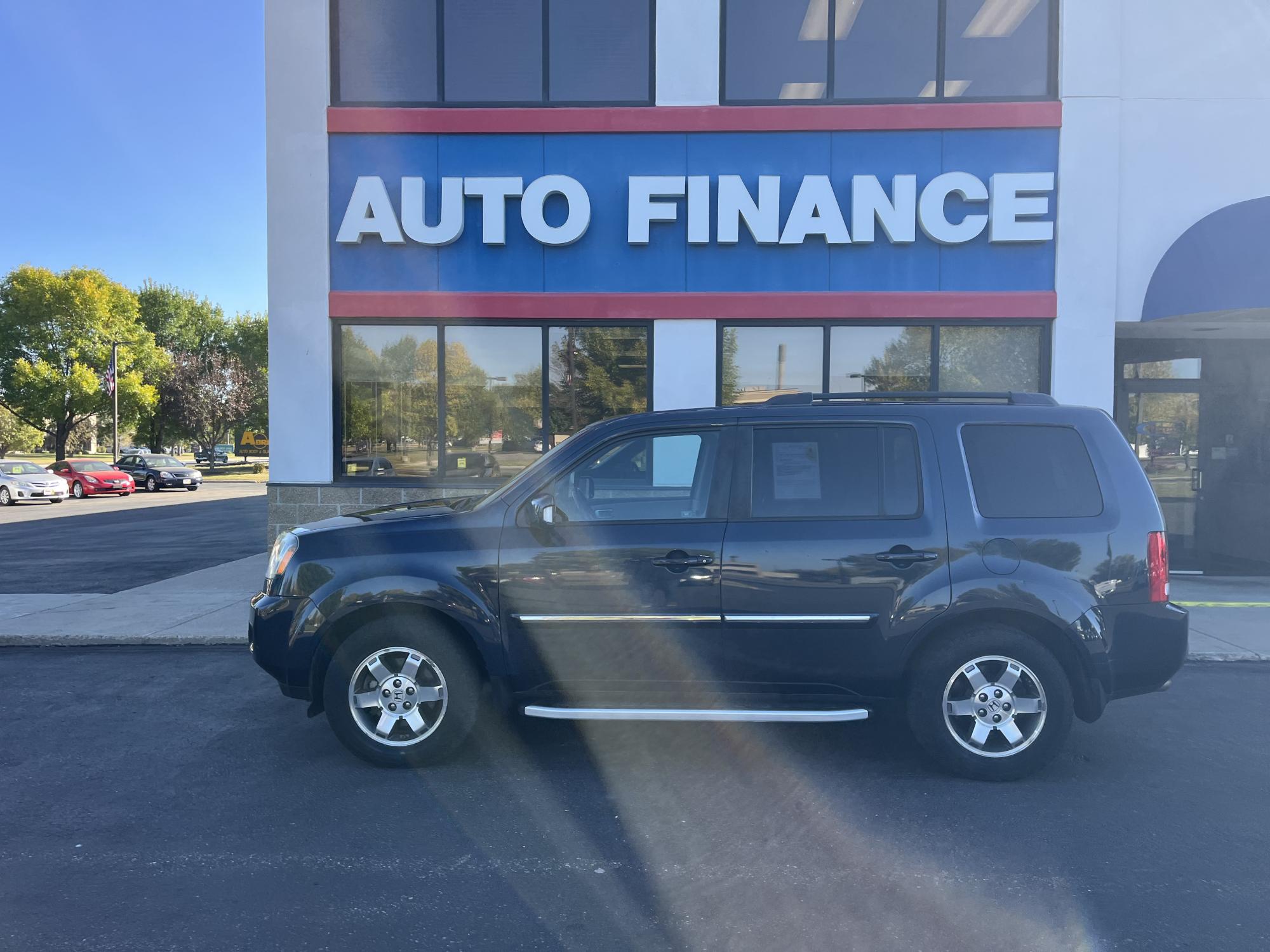 photo of 2011 Honda Pilot Touring 4WD 5-Spd AT with DVD